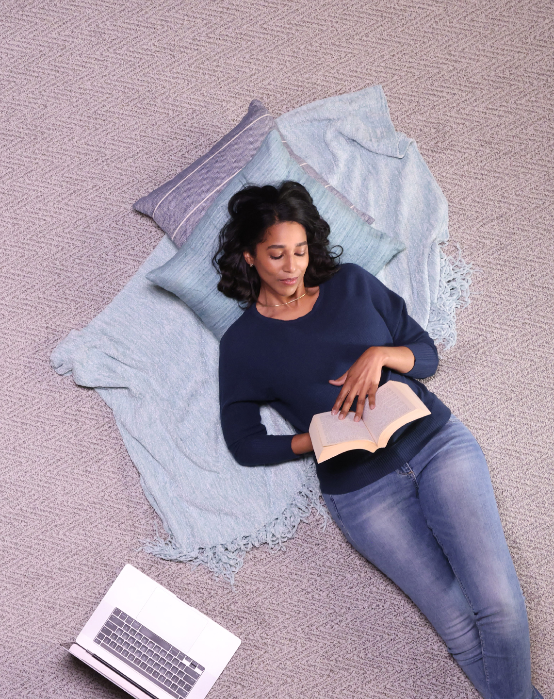 women laying on cozy carpet