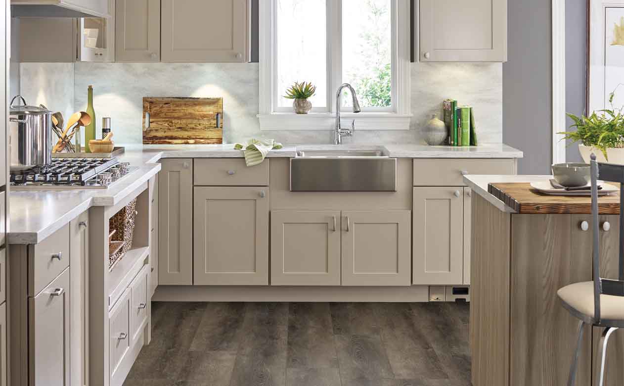 beige cabinets in farmhouse kitchen